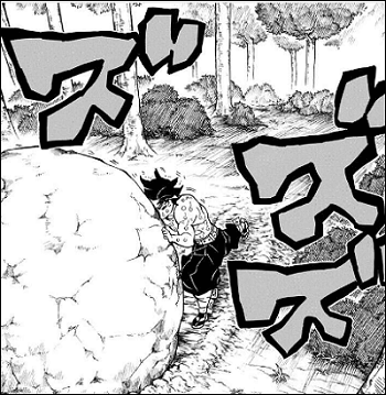 巨石を動かす男性